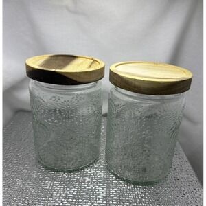 Set of 2 Embossed Glass Canisters with Natural Wood Lids Clear Floral Jars